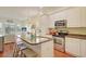 Spacious kitchen with granite countertops, stainless steel appliances, and an island at 204 Michigan Ave # D2, Folly Beach, SC 29439