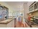 Bright kitchen features granite countertops, stainless steel appliances, and an open layout at 204 Michigan Ave # D2, Folly Beach, SC 29439