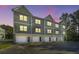 Townhouses with attached garages at dusk at 211 Cache Ct # 6, Charleston, SC 29414