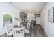 Gray kitchen cabinets and granite countertops with a breakfast bar at 211 Cache Ct # 6, Charleston, SC 29414