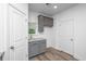 Small kitchen with gray cabinets and granite countertops at 211 Cache Ct # 6, Charleston, SC 29414
