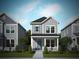 Two-story gray house with blue shutters, front porch, and walkway at 343 Trailmore Ln, Summerville, SC 29486
