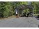 Metal storage shed with parking for multiple vehicles and equipment at 443 Lazy Hill Rd, Moncks Corner, SC 29461