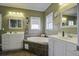 Relaxing bathroom with a garden tub and double vanity at 443 Lazy Hill Rd, Moncks Corner, SC 29461