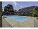 Inviting in-ground pool with surrounding patio and lounge chairs at 443 Lazy Hill Rd, Moncks Corner, SC 29461