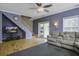 Spacious living room with hardwood floors, access to deck, and neutral color palette at 443 Lazy Hill Rd, Moncks Corner, SC 29461