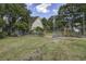 Large backyard with a garden and plenty of space for outdoor activities at 443 Lazy Hill Rd, Moncks Corner, SC 29461