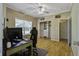 Home office with hardwood floors, window, and built-in closet at 443 Lazy Hill Rd, Moncks Corner, SC 29461