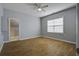 Bright bedroom with hardwood floors and a ceiling fan at 443 Lazy Hill Rd, Moncks Corner, SC 29461