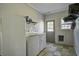 Laundry room with washer, dryer, and exterior access at 443 Lazy Hill Rd, Moncks Corner, SC 29461