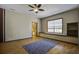 Spacious bonus room with hardwood floors and built-in shelving at 443 Lazy Hill Rd, Moncks Corner, SC 29461