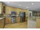 Modern kitchen with stainless steel appliances and granite countertops at 443 Lazy Hill Rd, Moncks Corner, SC 29461