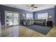 Spacious living room with hardwood floors and access to deck at 443 Lazy Hill Rd, Moncks Corner, SC 29461