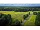 Aerial view of farmland with hay bales and a country road at 0 Tuten Road, Round O, SC 29474