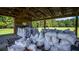Inside storage shed with many bags of materials at 0 Tuten Road, Round O, SC 29474