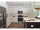 Modern kitchen with stainless steel appliances and island at 300 Whispering Breeze Ln, Summerville, SC 29486