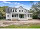 Two-story farmhouse-style home with a large front porch at 964 Pine Hollow Rd, Mount Pleasant, SC 29464