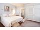 Light bedroom with hardwood floors and white closet at 1 Wall St, Charleston, SC 29401