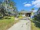 Ranch home with a spacious yard and driveway at 200 Wappoo Rd, Charleston, SC 29407