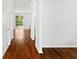 Bright hallway with hardwood floors and doors at 180 Cherry Grove Dr, Summerville, SC 29483