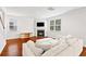 Living room with hardwood floors, fireplace, and sectional sofa at 180 Cherry Grove Dr, Summerville, SC 29483