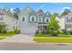 Two-story light teal house with white accents at 180 Cherry Grove Dr, Summerville, SC 29483