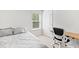 Bright bedroom with a comfortable bed and built-in workspace at 180 Cherry Grove Dr, Summerville, SC 29483