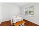 Bright dining room featuring hardwood floors and a table with seating for four at 180 Cherry Grove Dr, Summerville, SC 29483