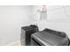 Laundry room with washer, dryer, and overhead shelving at 180 Cherry Grove Dr, Summerville, SC 29483
