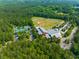 Aerial view of community featuring a park, pond, and houses at 180 Cherry Grove Dr, Summerville, SC 29483