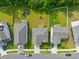 Aerial view of houses with gray roofs and green lawns at 180 Cherry Grove Dr, Summerville, SC 29483