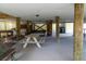 Under house area with picnic table and extra storage at 2302 Palmetto Blvd, Edisto Beach, SC 29438