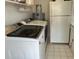 Laundry room with washer, dryer, and refrigerator at 2302 Palmetto Blvd, Edisto Beach, SC 29438