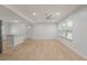 Bright living room with hardwood floors and ceiling fan at 7049 Kenneth Dr, North Charleston, SC 29406