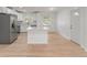 Renovated kitchen boasting stainless steel appliances and white cabinetry at 7049 Kenneth Dr, North Charleston, SC 29406