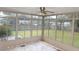 Sunroom with backyard view and ceiling fan at 501 Hansford Dr, Goose Creek, SC 29445