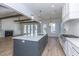 Open concept kitchen features a large island and white cabinetry at 3881 Summerton St, Mount Pleasant, SC 29466
