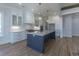 Bright kitchen with white cabinets, large island, and stainless steel appliances at 3881 Summerton St, Mount Pleasant, SC 29466