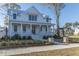 White farmhouse with wrap around porch at 3881 Summerton St, Mount Pleasant, SC 29466