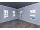 Bright dining room with hardwood floors and a modern chandelier at 3881 Summerton St, Mount Pleasant, SC 29466