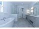 Spa-like bathroom with freestanding tub, double vanity, and glass shower at 3881 Summerton St, Mount Pleasant, SC 29466