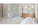 Spa-like bathroom featuring a large shower, soaking tub, and modern vanity at 3881 Summerton St, Mount Pleasant, SC 29466