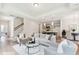 Bright and airy living room with hardwood floors at 426 Queenview Ln, Charleston, SC 29414