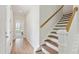 Bright entryway with wood stairs and light flooring at 426 Queenview Ln, Charleston, SC 29414