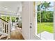 Inviting entryway with hardwood floors and view of the living room and backyard at 426 Queenview Ln, Charleston, SC 29414