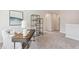 Cozy upstairs office nook with a desk and shelving unit at 426 Queenview Ln, Charleston, SC 29414