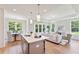Open concept kitchen with island and hardwood floors at 426 Queenview Ln, Charleston, SC 29414