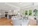 Open living space with hardwood floors and kitchen at 426 Queenview Ln, Charleston, SC 29414