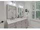 Double vanity bathroom with gray cabinets and quartz countertop at 2159 Parkway Dr, Charleston, SC 29412