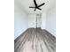 Bright bedroom featuring hardwood floors and ceiling fan at 2216 Clinton St, North Charleston, SC 29405